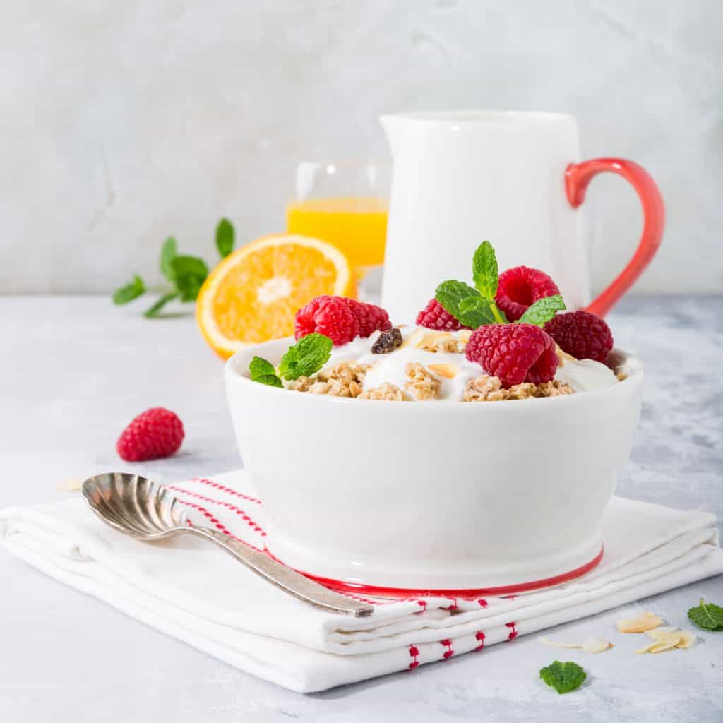 Healthy breakfast with granola and berries